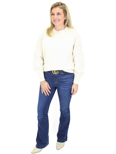 Cable Knit Sleeve Sweater - Cream front view with Spanx jeans.