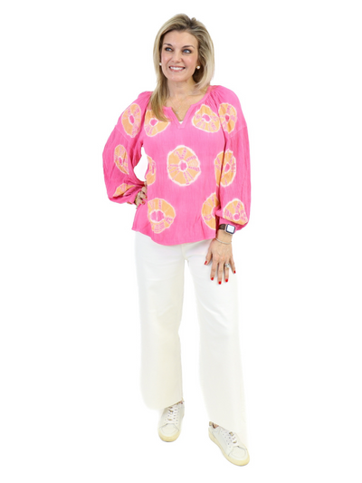 Tie Dye Peasant Top - Pink front view with white jeans.