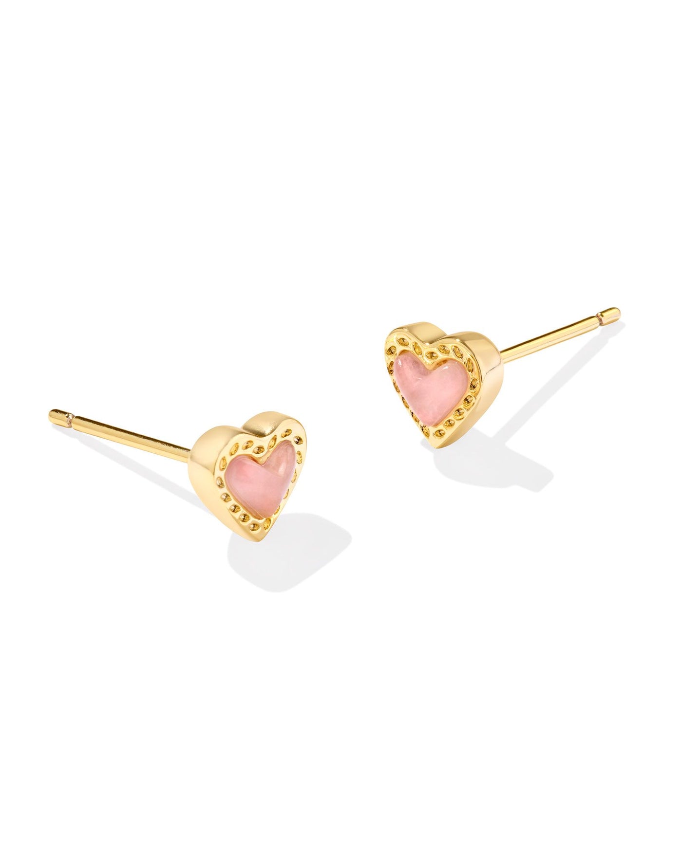 Gold studs with rose quartz heart pendant, front view.