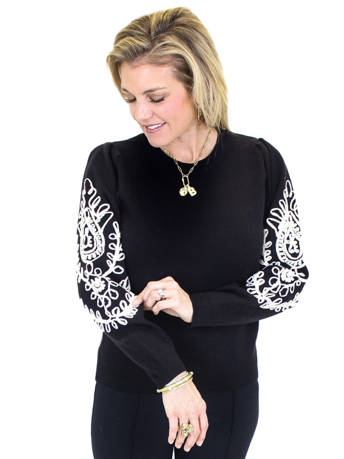 Embroidered Sleeve Soft Knit Sweater - Black sleeve view.