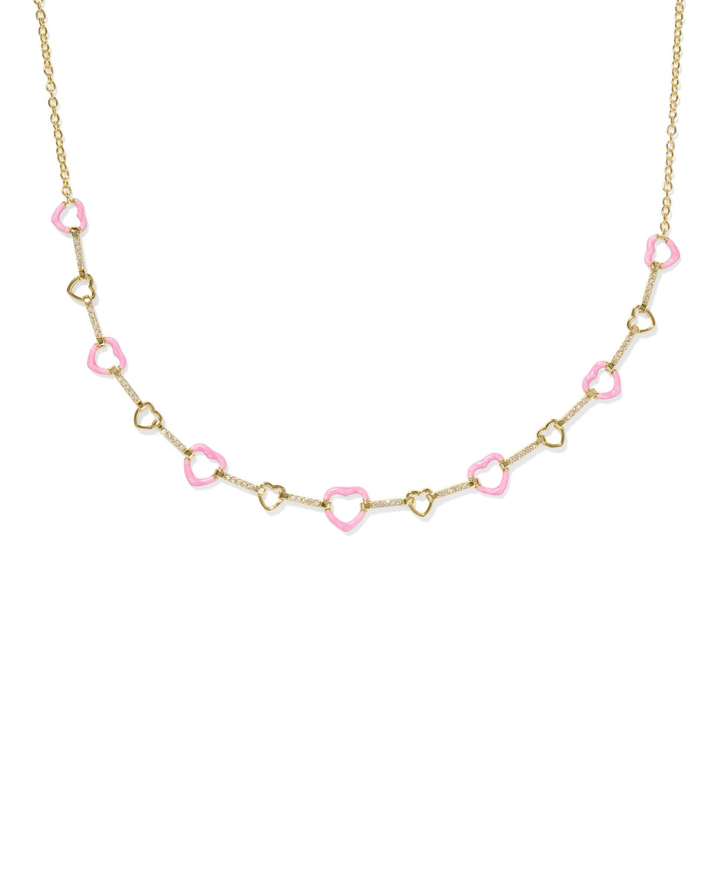 Delicate gold necklace with pink and gold open heart motifs, closeup.