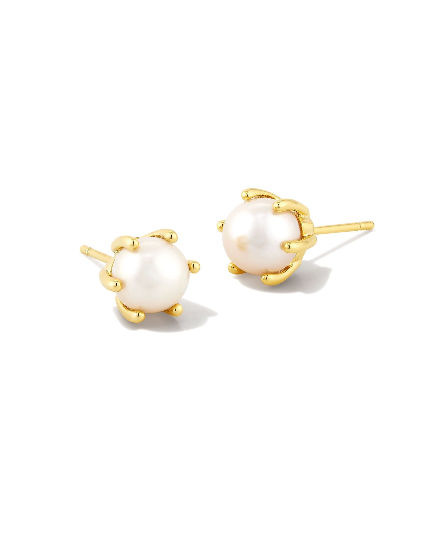 Kendra Scott Ashton Pearl Studs in Gold on white background, front view.