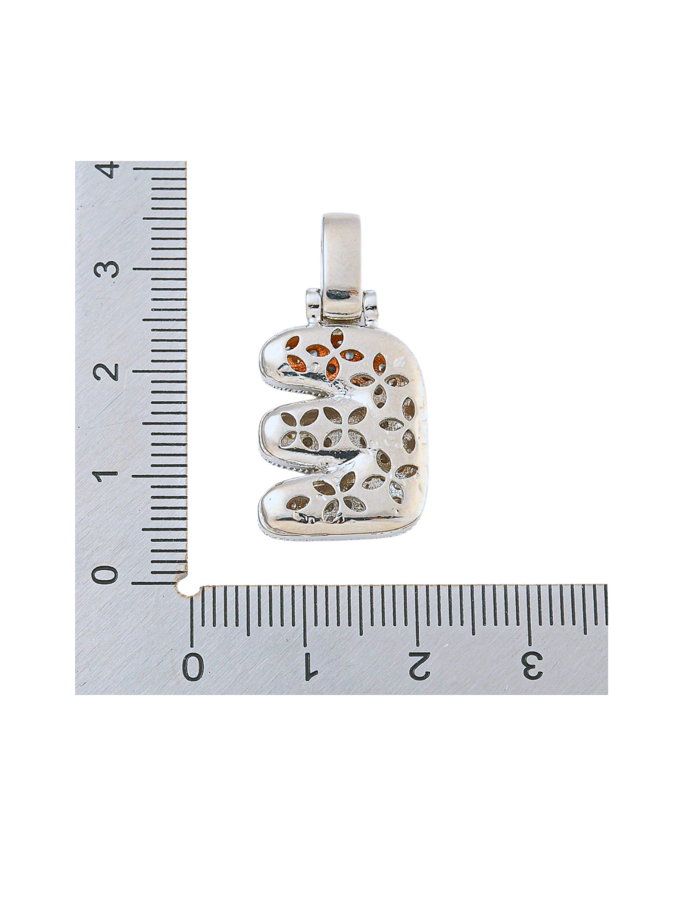 Back view of the Silver Rhinestone Bubble Letter "E" Charm with a ruler