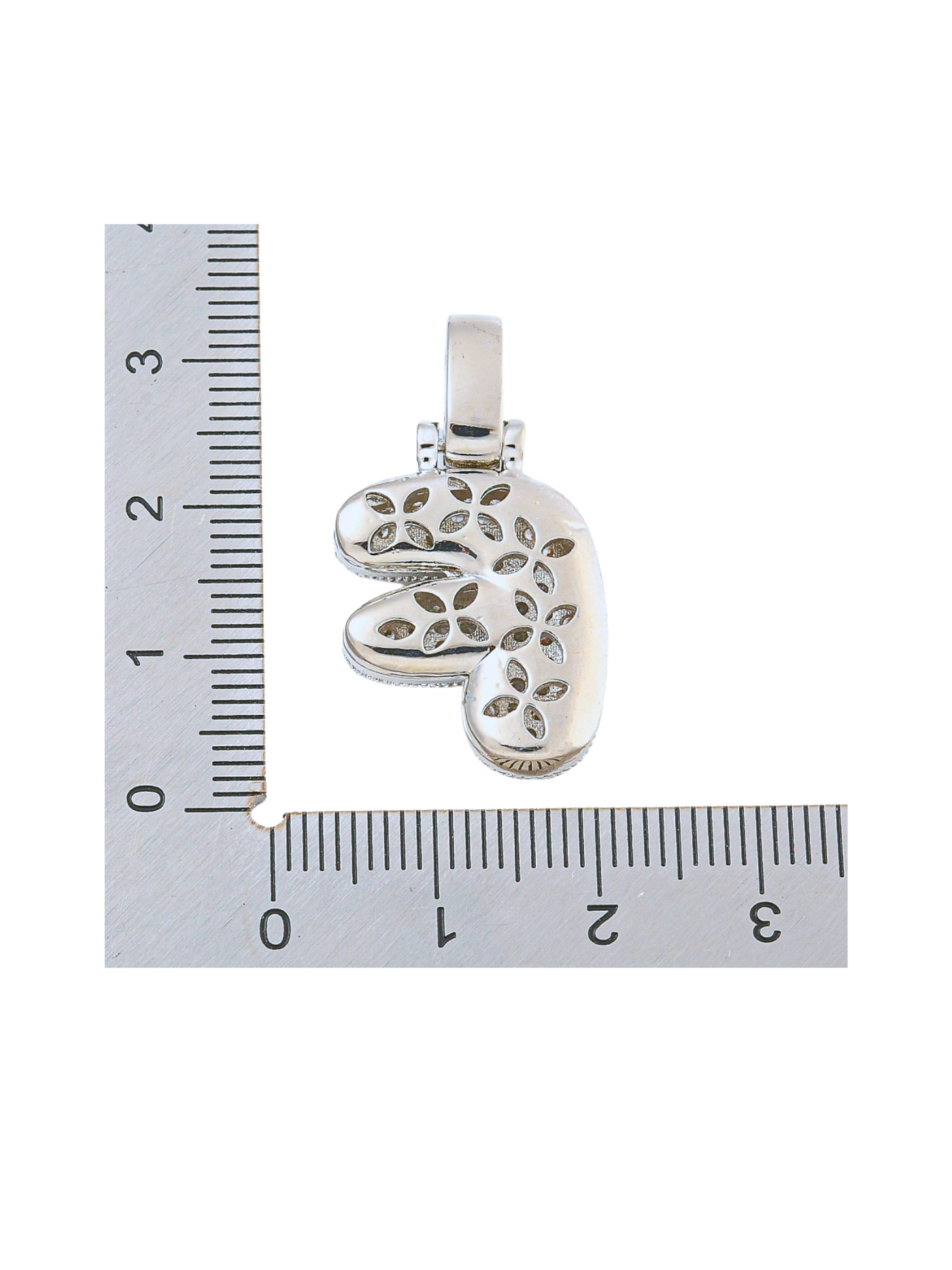 back view of the Silver Rhinestone Bubble Letter "F" Charm with a ruler