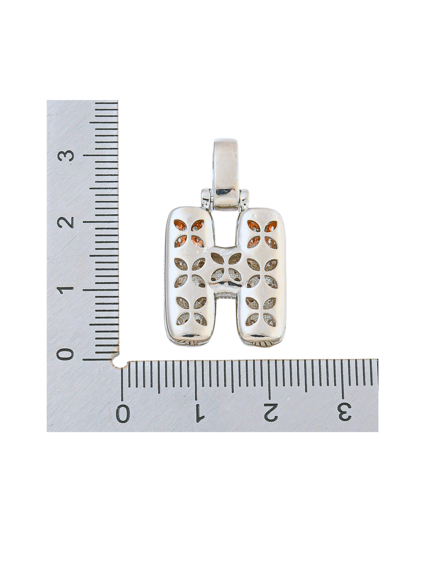 Back view of the Silver Rhinestone Bubble Letter "H" Charm with a ruler