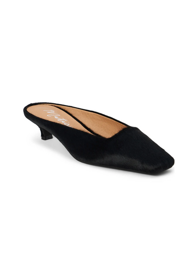 Black cowhide kitten heel mule, front.