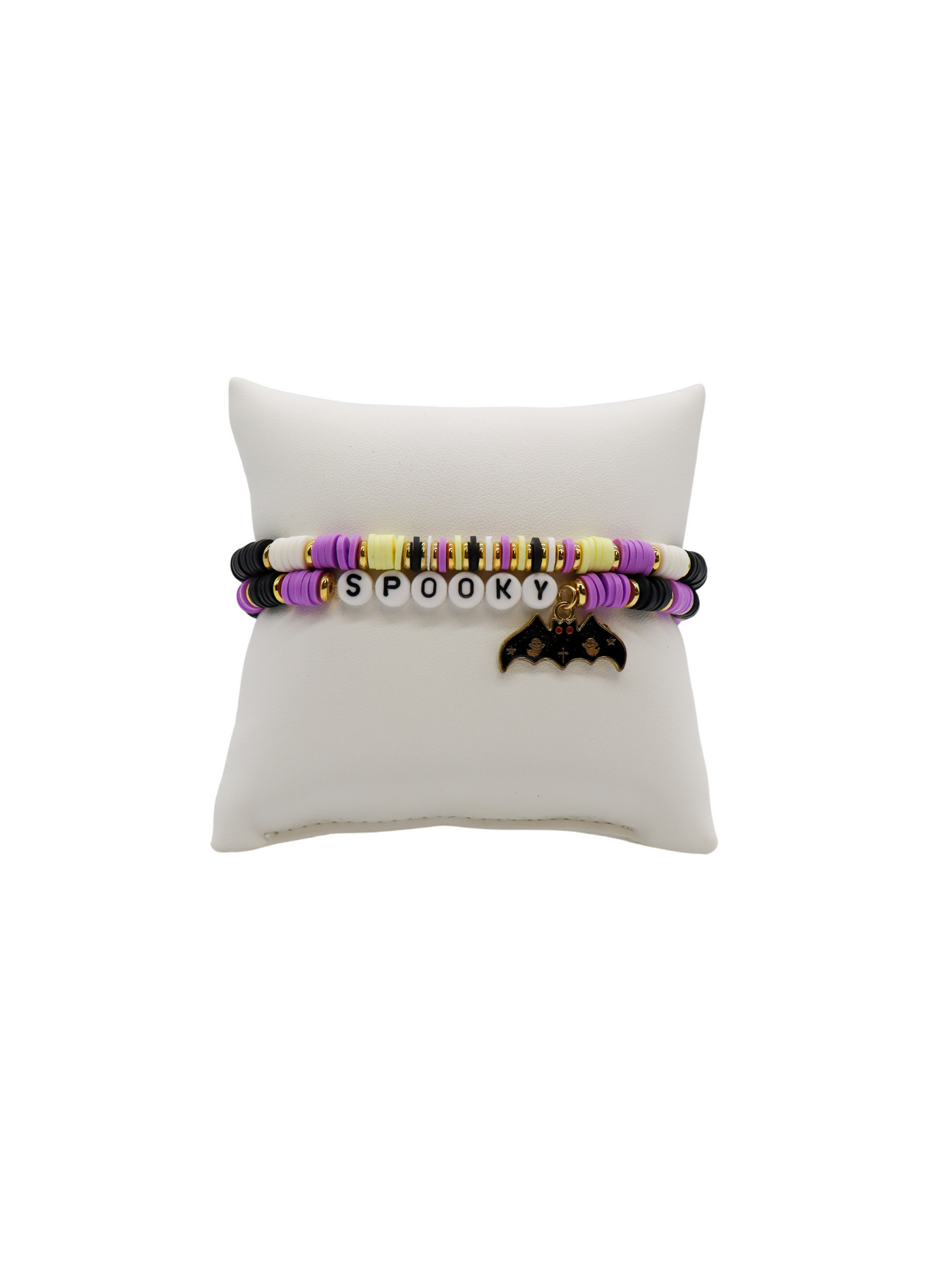 Set of 2 heishi beaded bracelets in black, purple, and green stripes with gold beaded accents, "spooky" letter beads, and bat charm.