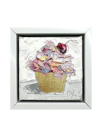 Pink and blue cupcake with cherry and gold foil wrapper on canvas.