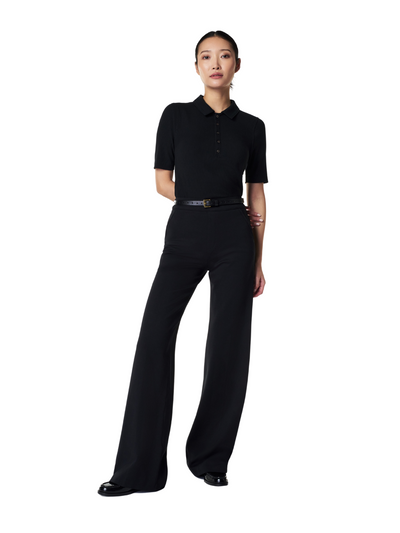 Spanx black ponte pant on model, front.