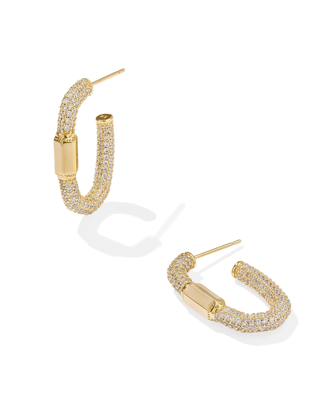 Gold pave oval hoops with gold bar accent, front view.