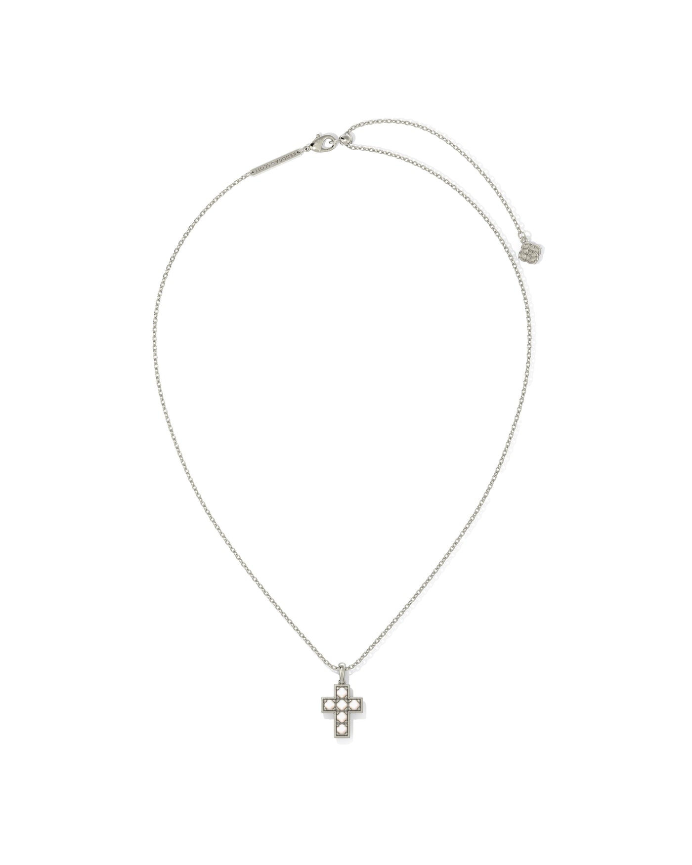 Silver necklace with pearl studded cross pendant.