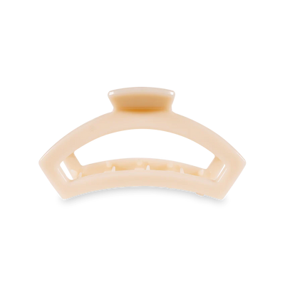 Open almond beige medium hair clip.