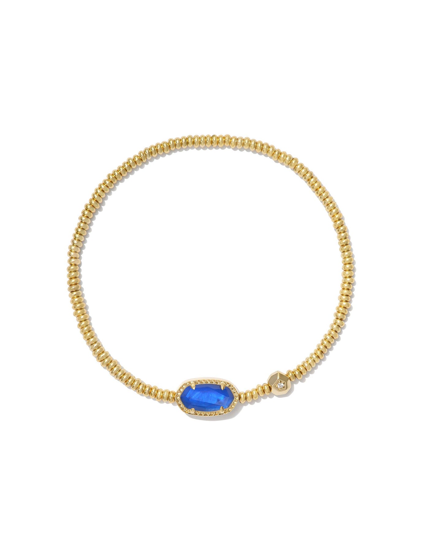 Gold beaded stretch bracelet with cobalt blue pendant.