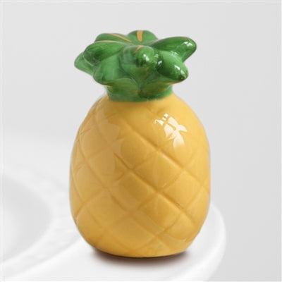 Golden yellow pineapple with green leaves mini