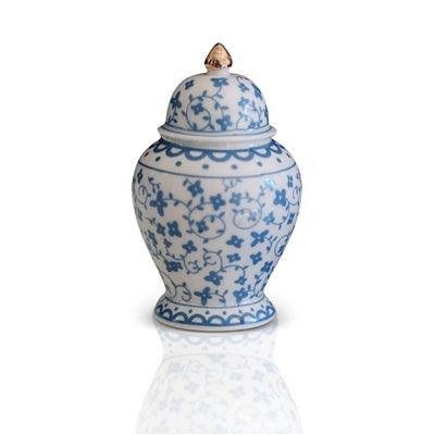 Blue and white ginger jar with gold tip