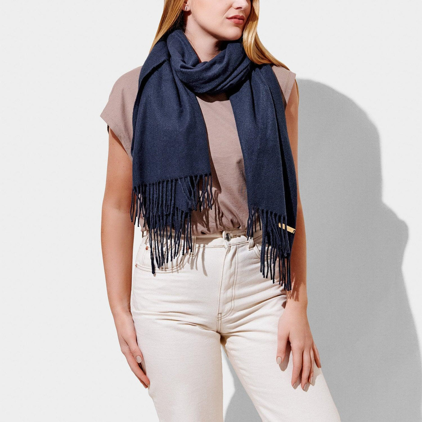 Navy blanket scarf on a model