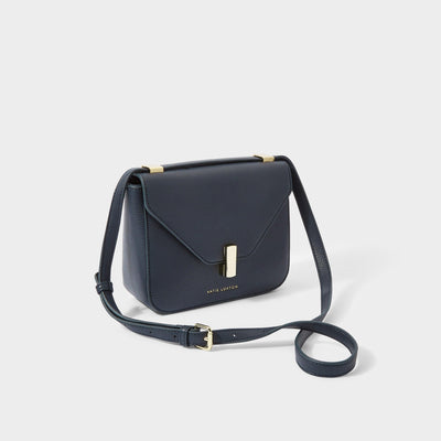 Navy crossbody bag showing full length of strap