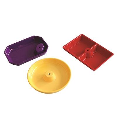 Oblong octagon platter, red two sectioned platter, and yellow round platter