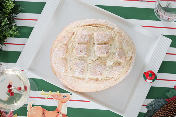 Stone rectangle serving platter with bread on display